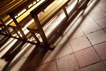 Wooden benches in a churchの写真素材