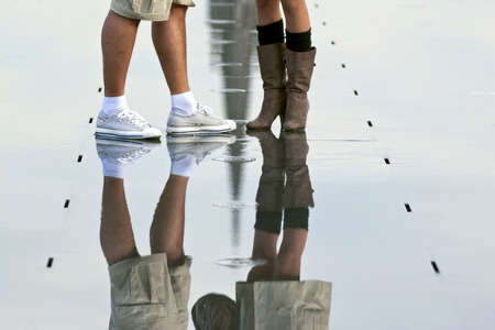 Rendez-vous of a couple in a pool of waterの写真素材