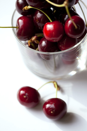 Red cherries in a glassの写真素材