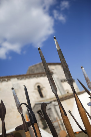 Medieval arms in front of a churchの写真素材