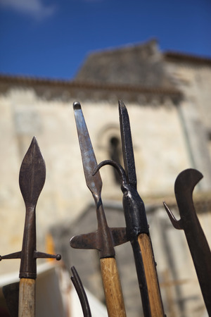 Medieval arms in front of a churchの写真素材