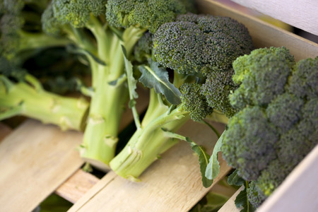 Broccoli in crate on a market stallの写真素材