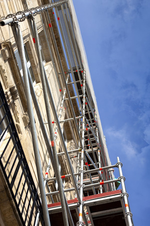 Scaffolding on a renovation site of a classic French buildingの写真素材