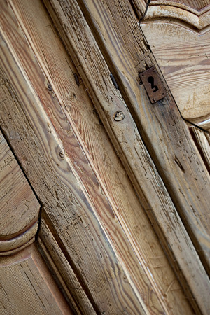 Detail of an old pine wood cupboardの写真素材