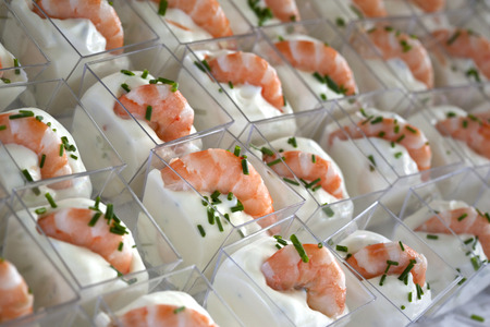 Shrimp and herbs cream in small glassesの写真素材