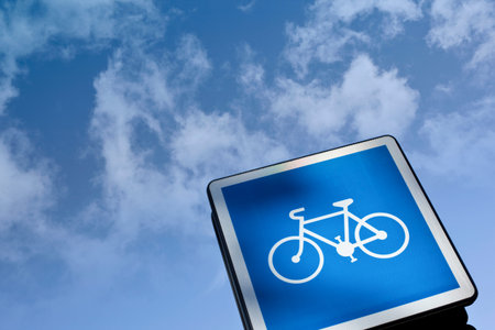 Close up of a bike sign blue sky background
