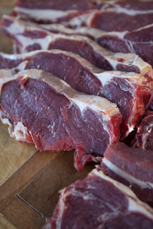 Close up of beef steaks in a butcher shopの写真素材