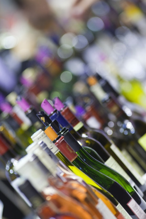 Wine bottles for a tasting in a wineryの写真素材