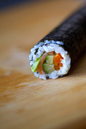 Close up of a Japanese maki on a tableの写真素材