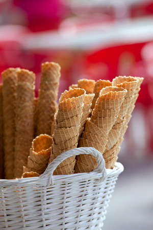 Ice cream cones in a wicker basketの写真素材