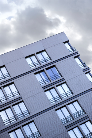 Facade of a modern residence in the cityの写真素材