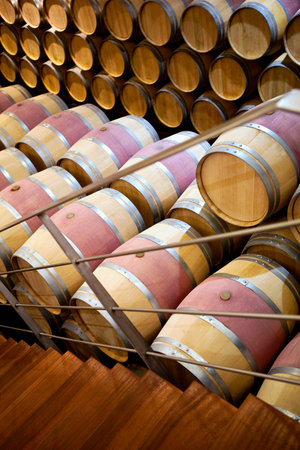 Storage of wine barrels in a cellar near Bordeau, France