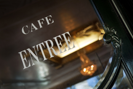 Sign on the window of a French bistroの写真素材