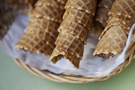 Ice cream cones on a wicker basketの写真素材