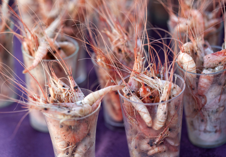 Shrimp in glasses on a party buffetの写真素材