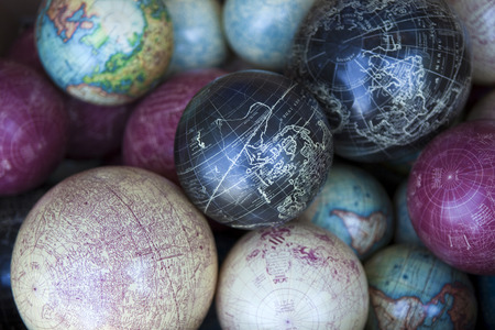 Vintage weathered globes in an flea marketの写真素材