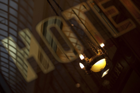 Reflection on a window of a vintage hotel in Parisの写真素材