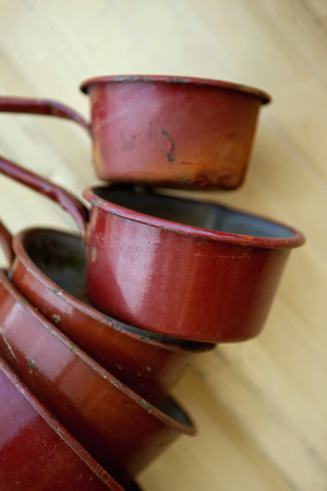 Set of old pans in a flea marketの写真素材