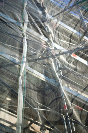 Net in the wind on a scaffolding