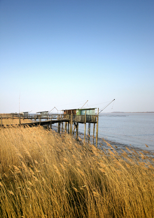 Fishermen cabins along the estuary near Bordeauxの写真素材