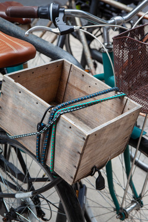 Wooden crate on the luggage rack of a bicycleの写真素材