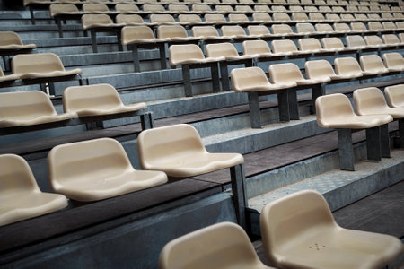 Empty seats on the bleachers of a performance hallの写真素材