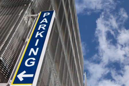 Parking sign on a building facadeの写真素材