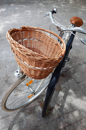 Wicker basket on a bikeの写真素材