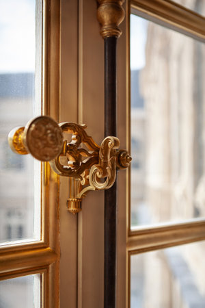 Copper window handle in a French mansionの写真素材