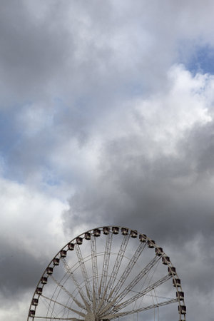 Big wheel and stormy skyの写真素材
