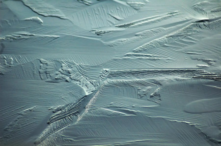 ice patterns formed on a frozen loch