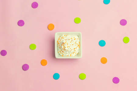 Celebration Dessert on Confetti Backgroundの写真素材
