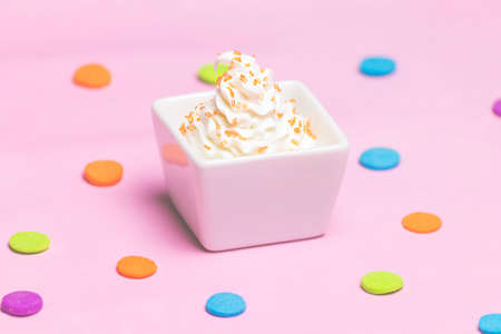 Celebration Dessert on Confetti Backgroundの写真素材