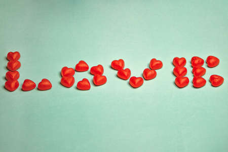 Love Spelled in Candy Heart - Valentine's Day Typographyの写真素材