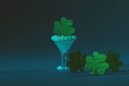 St. Patrick's Green, Sugar Rimmed, Confetti Cocktail with Four Wooden Shamrocksの写真素材