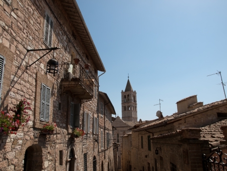 The tower of St.Claire Basilica in Assisiの写真素材