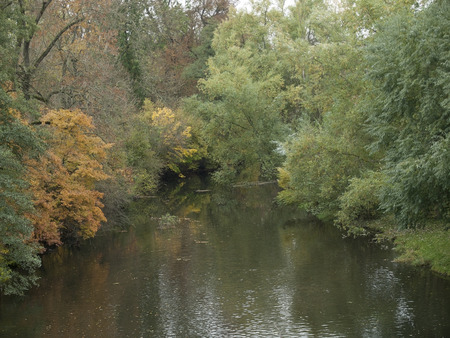 Fabulous autumn landscape beyond and waterの写真素材