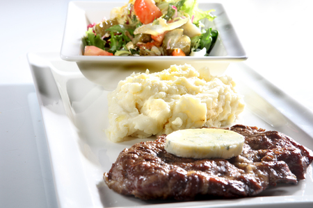 Appetizing dishes served on a white plate.の写真素材