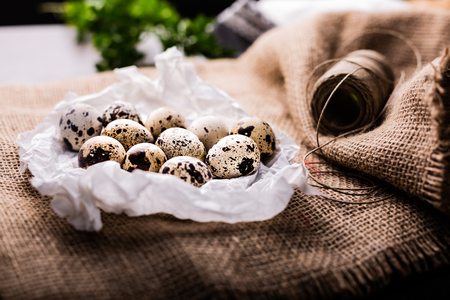 Ecological composition, quail eggs on a linen tablecloth.の写真素材