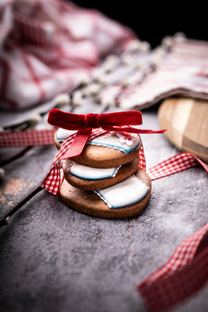 Easter cookies and Christmas decorations on a wooden background