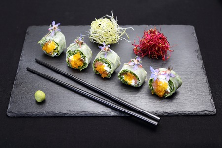 Set of sushi on a black stoneの写真素材
