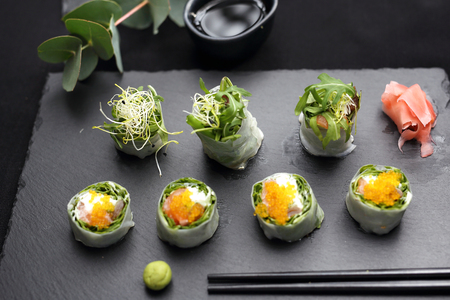 Set of sushi on a black stoneの写真素材
