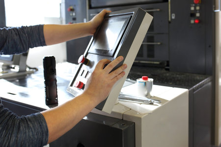 Work in a printing house, operation of printing machines