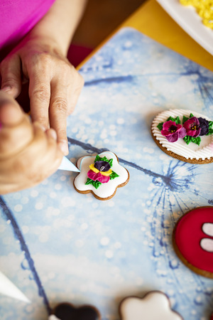 Beautiful decorative cakes, hand-decorated with icing and sugar mass.の写真素材