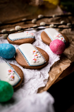 Easter cookies and Christmas decorations on a wooden background