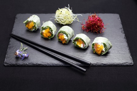 Set of sushi on a black stoneの写真素材