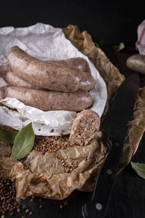 Thin sausage, white blood sausage in composition with herbs and buckwheatの写真素材
