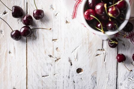 Composition of ripe fruit on a wooden background, top viewの写真素材