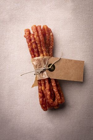 Smoked sausage, a composition of traditional dry, thin rural meats Regional food.の写真素材