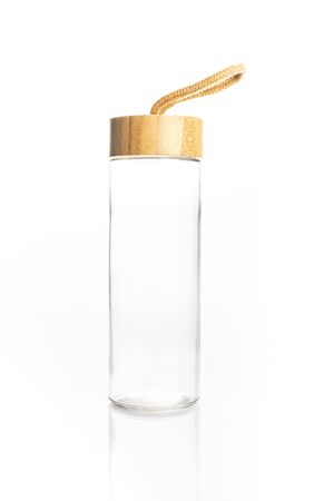 Glass bidon. Reusable water bottle with watertight lid with a string handle. Zero waste concept, eco friendly. Product isolated on white.の写真素材